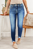 Jean skinny bleu à ourlet brut longueur cheville