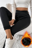 Leggings thermiques noirs à taille croisée et jambes cousues