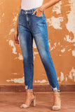 Jean skinny bleu à ourlet brut longueur cheville