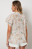 Haut à col mandarin à imprimé floral multicolore