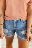Short en jean bleu ciel à ourlet roulé et déchirures