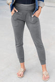 Legging gris à taille haute avec poches plissées